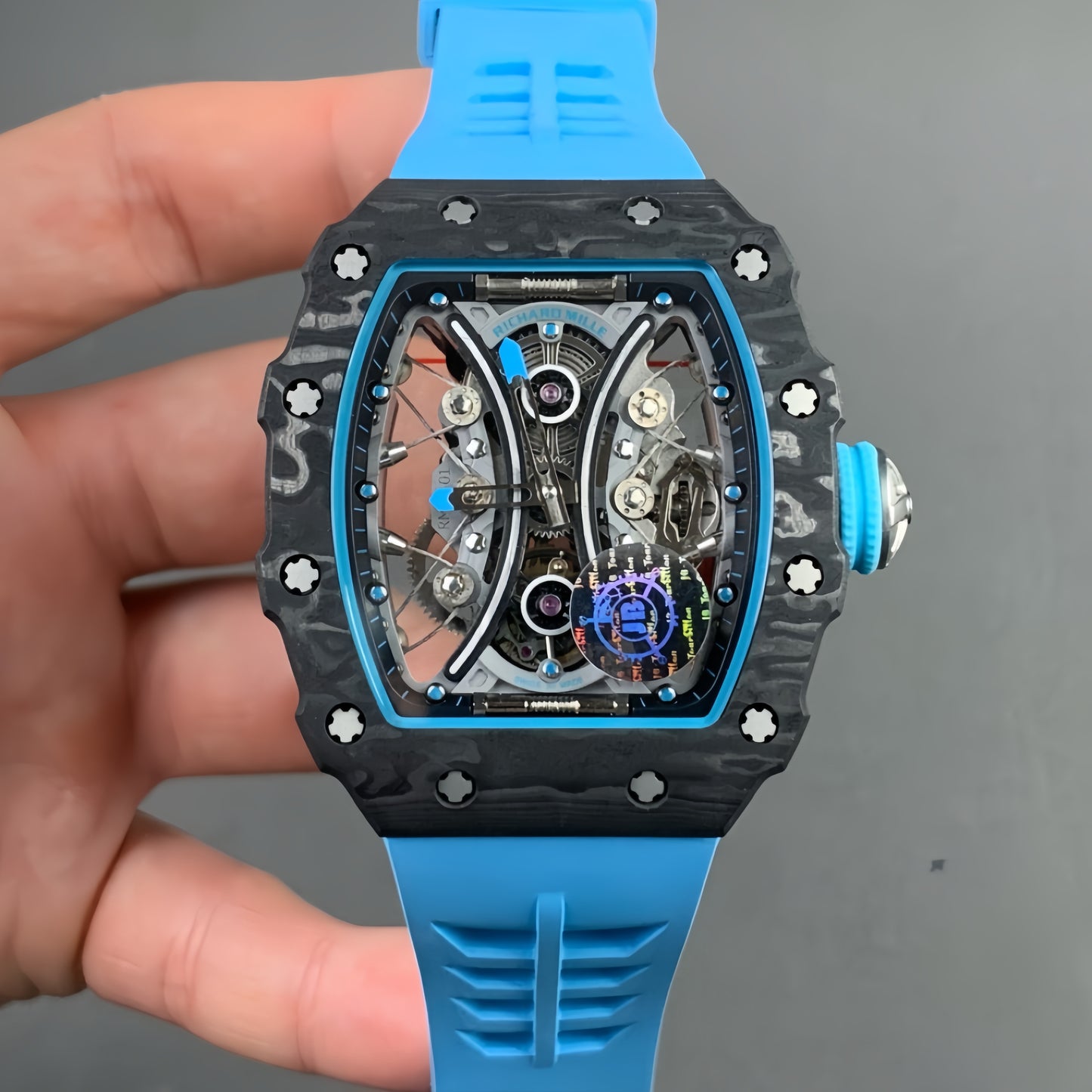 Montre Tourbillon Carbon JBF Best Edition RM53-01 avec cadran squelette sur bracelet en caoutchouc bleu