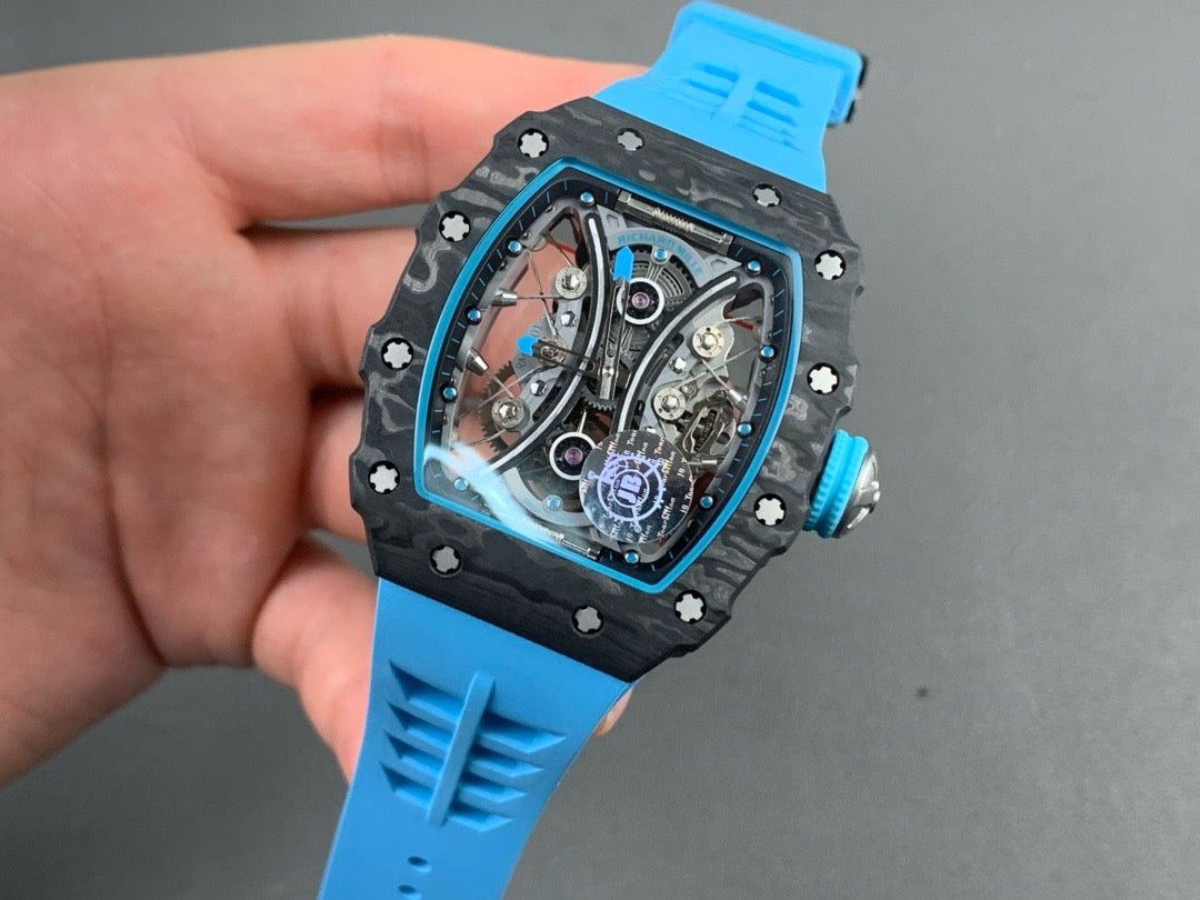 Montre Tourbillon Carbon JBF Best Edition RM53-01 avec cadran squelette sur bracelet en caoutchouc bleu