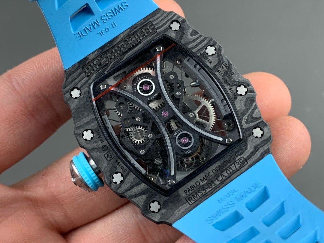 Montre Tourbillon Carbon JBF Best Edition RM53-01 avec cadran squelette sur bracelet en caoutchouc bleu